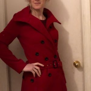 Dark red/maroon jacket.